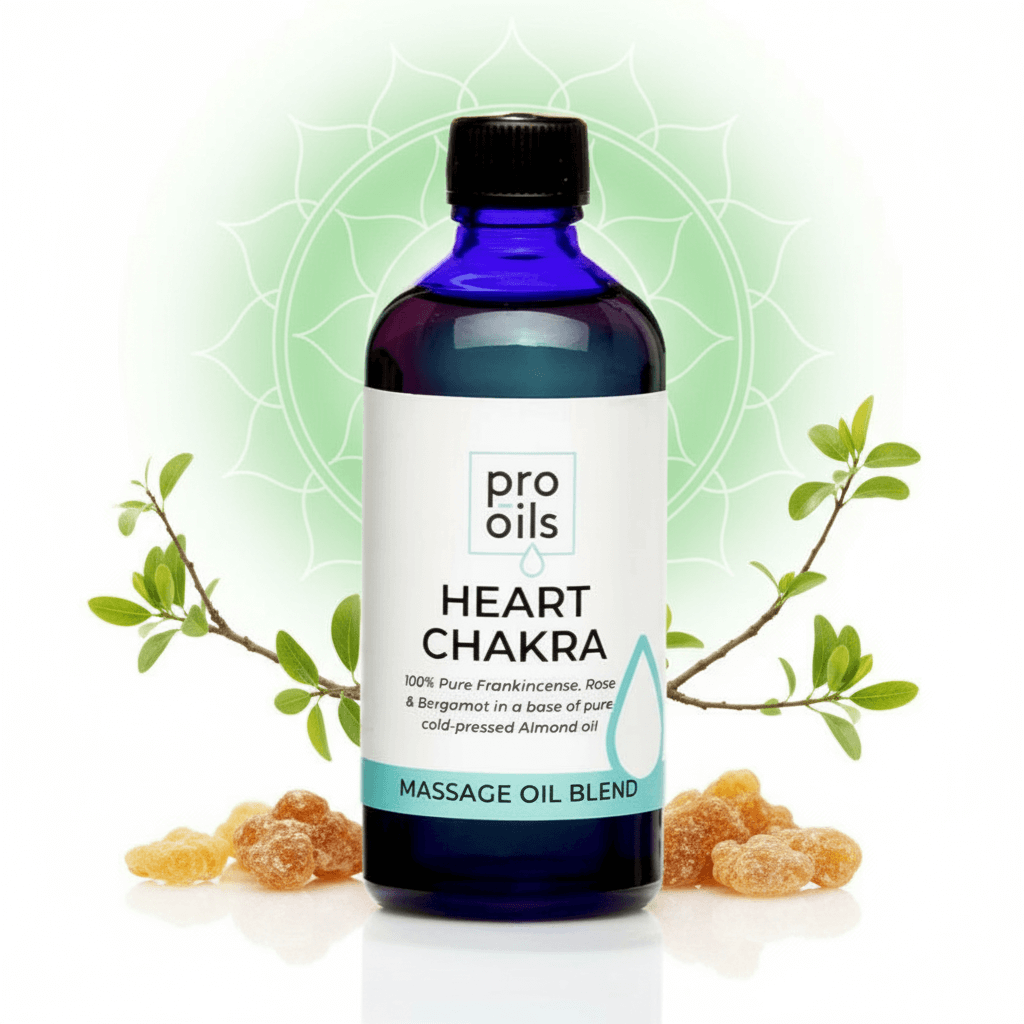 Bottle of Pro Oils Heart Chakra massage oil blend with a green background and leaves.