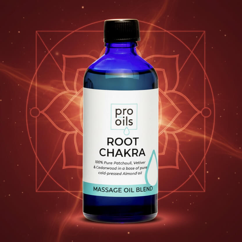 Bottle of Pro Oils Root Chakra massage oil blend on a red background with geometric designs.