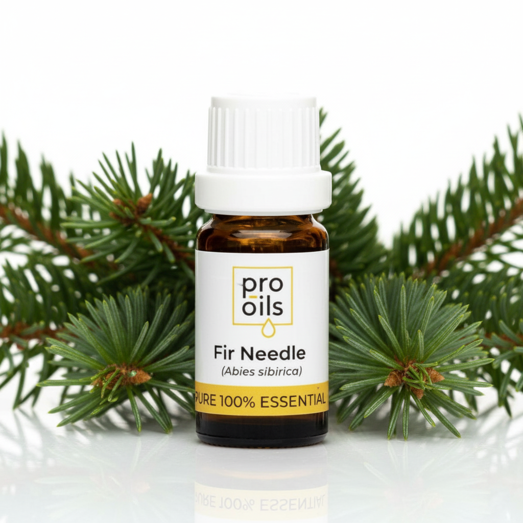 Bottle of Pro Oils Fir Needle essential oil with pine branches on a white background