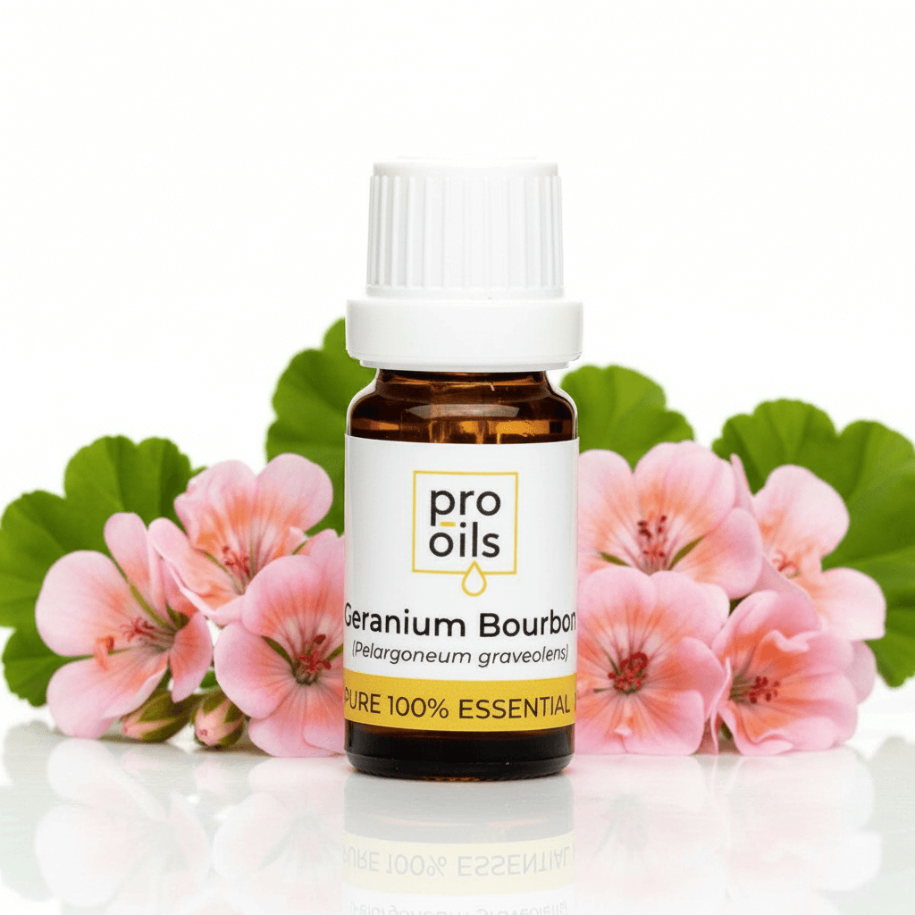 Bottle of Pro Oils Geranium Bourbon essential oil with pink flowers and green leaves in the background