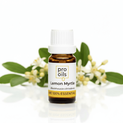 Bottle of Pro Oils Lemon Myrtle essential oil with leaves and flowers in the background