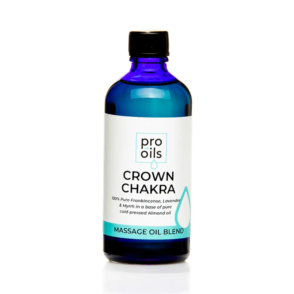 Bottle of Pro Oils Crown Chakra massage oil blend on a white background