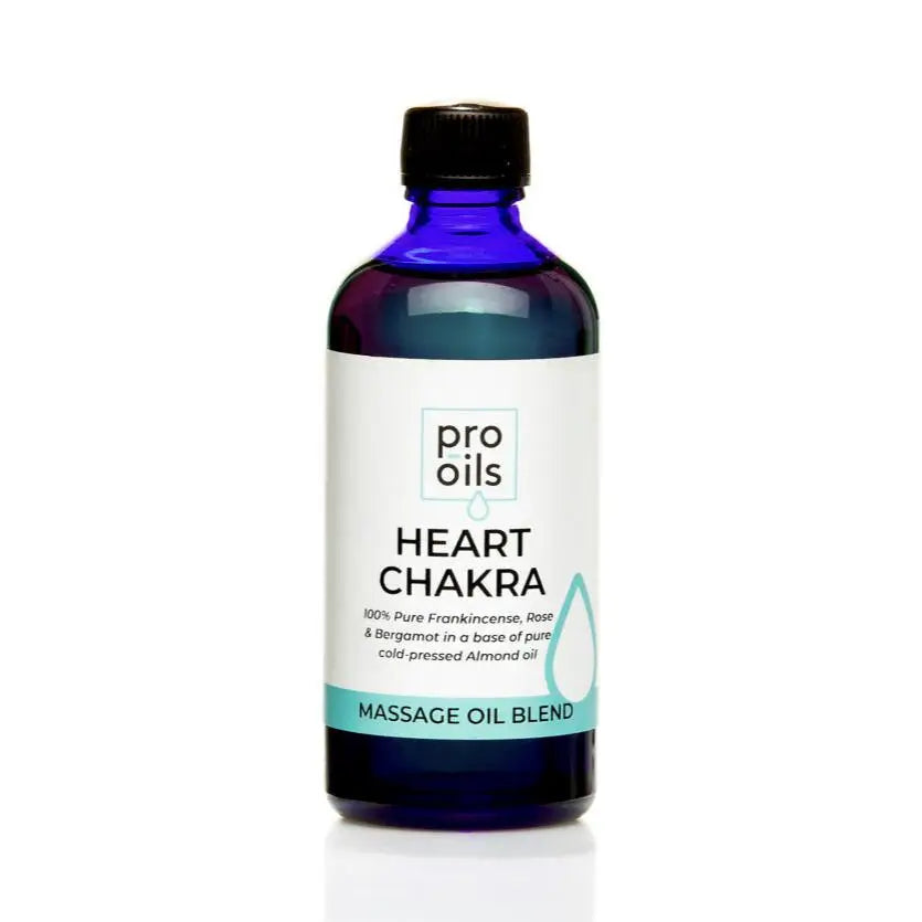 Bottle of Pro Oils Heart Chakra massage oil blend on a white background