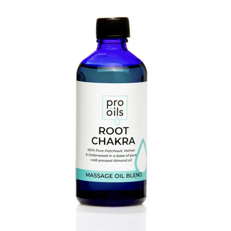 Blue bottle of Pro Oils Root Chakra massage oil blend on a white background