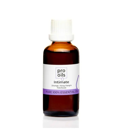 Bottle of Pro Oils Intimate essential oil on a white background