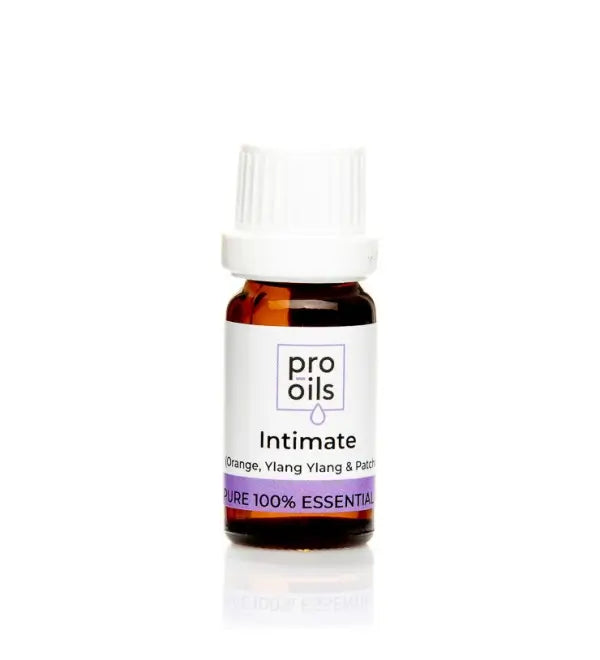 Bottle of Pro Oils Intimate essential oil on a white background