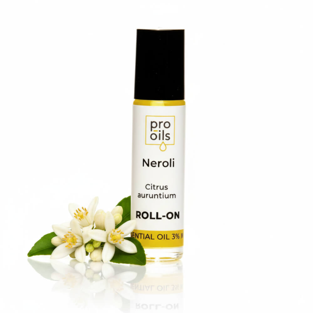 Roll-on bottle of pro oils Neroli essential oil with flowers on a white background