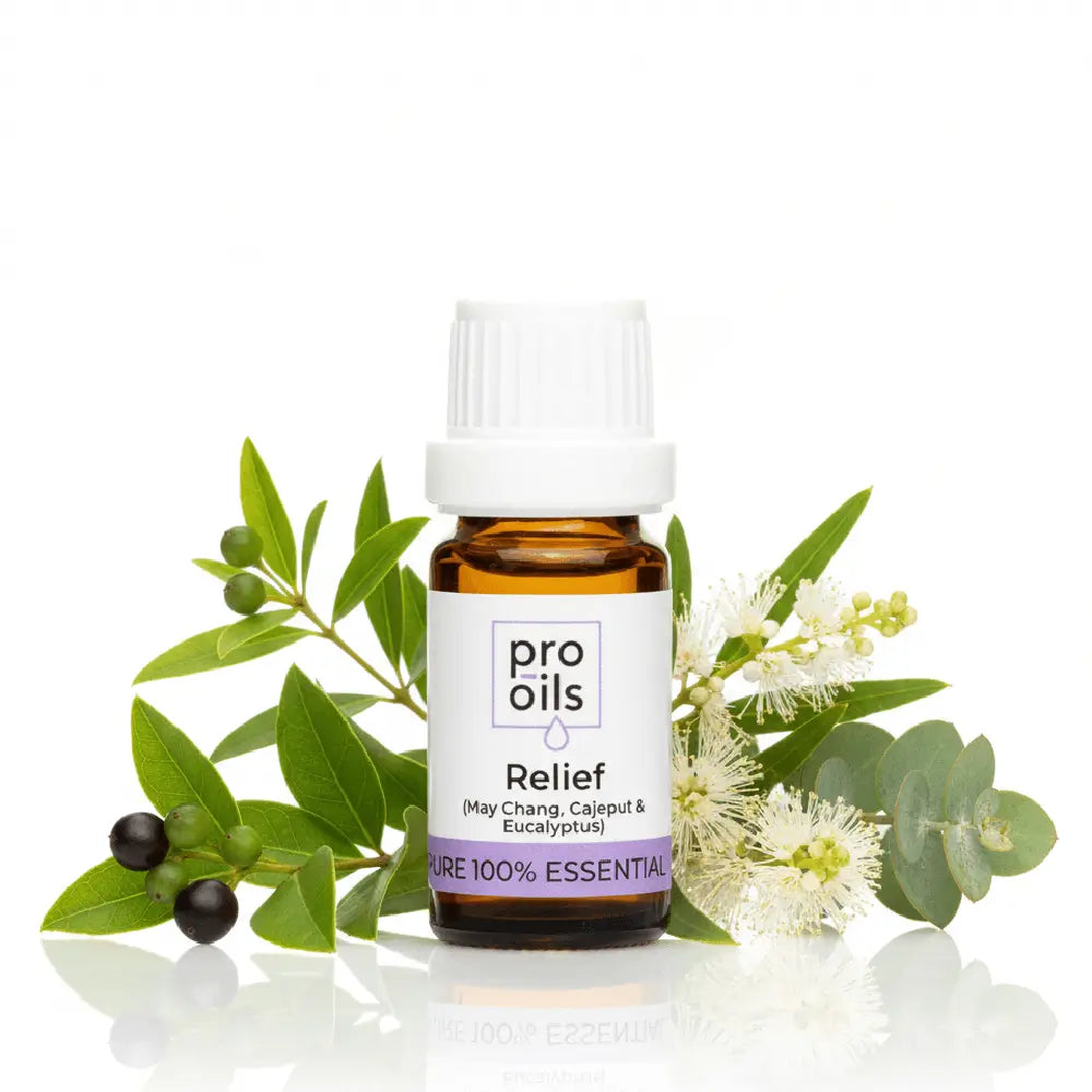 Pro Oils Relief essential oil bottle with green leaves and flowers on a white background