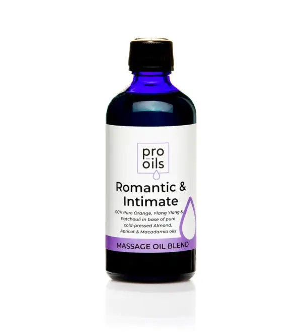 Bottle of Pro Oils Romantic &amp; Intimate massage oil blend on a white background