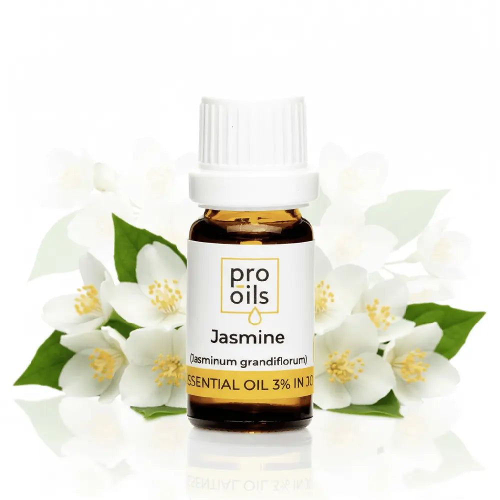 Bottle of Pro Oils Jasmine essential oil with jasmine flowers on a white background
