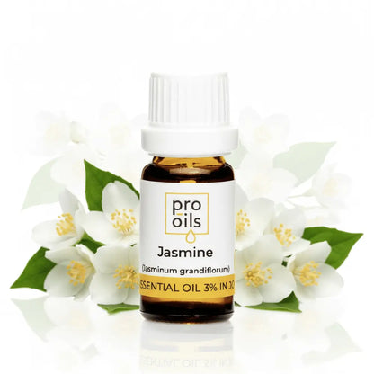 Bottle of Pro Oils Jasmine essential oil with jasmine flowers on a white background