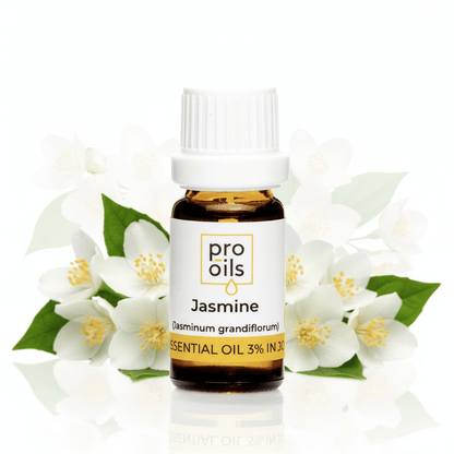 Bottle of Pro Oils Jasmine essential oil with jasmine flowers on a white background