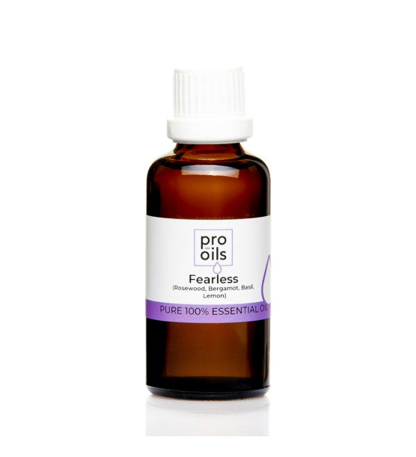 Pro Oils Fearless Blend essential oil bottle featuring a powerful blend to boost confidence, reduce anxiety, and promote inner strength.