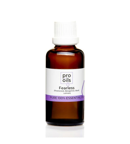 Pro Oils Fearless Blend essential oil bottle featuring a powerful blend to boost confidence, reduce anxiety, and promote inner strength.