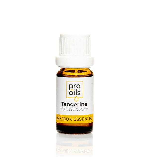 Tangerine essential oil bottle with fresh tangerines and leaves, showcasing its natural aroma and benefits.