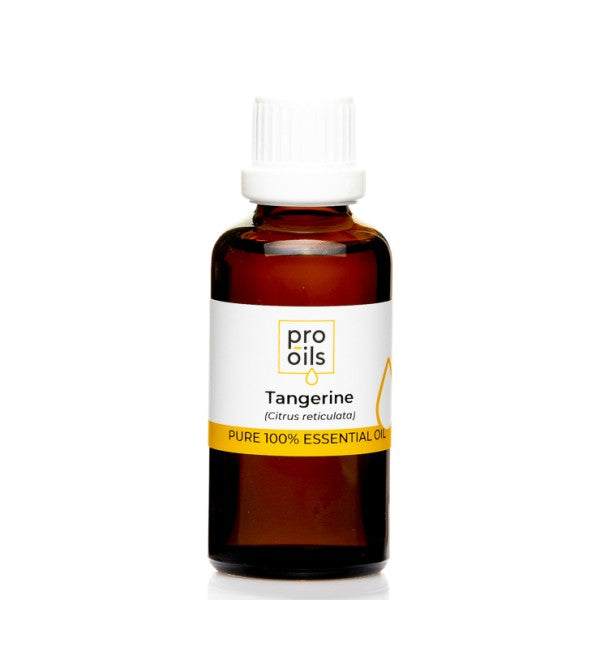 Tangerine essential oil bottle with fresh tangerines and leaves, showcasing its natural aroma and benefits.