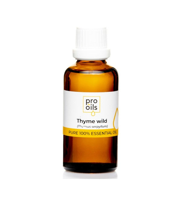 Wild Thyme essential oil bottle with fresh thyme sprigs, showcasing its therapeutic properties and natural aroma.